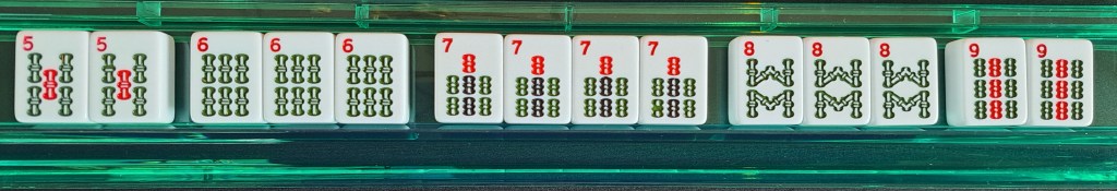 One suit of bams: Pair of 5s, Pung of 6s, Kong of 7s, Pung of 8s, Pair of 9s
