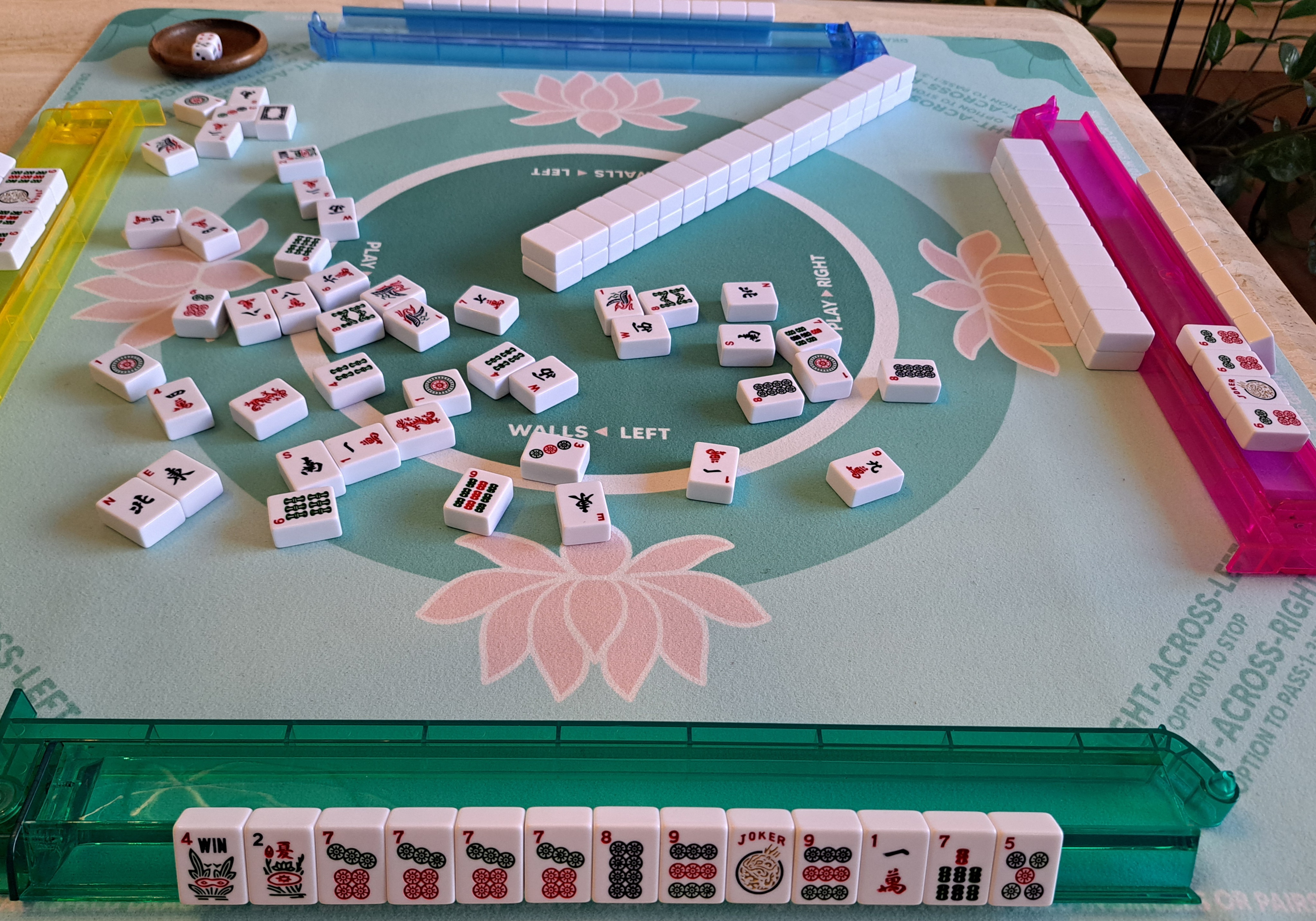American Mahjong hand example showing when to abandon FFFF 1111 22 3333 pattern due to discarded tiles.