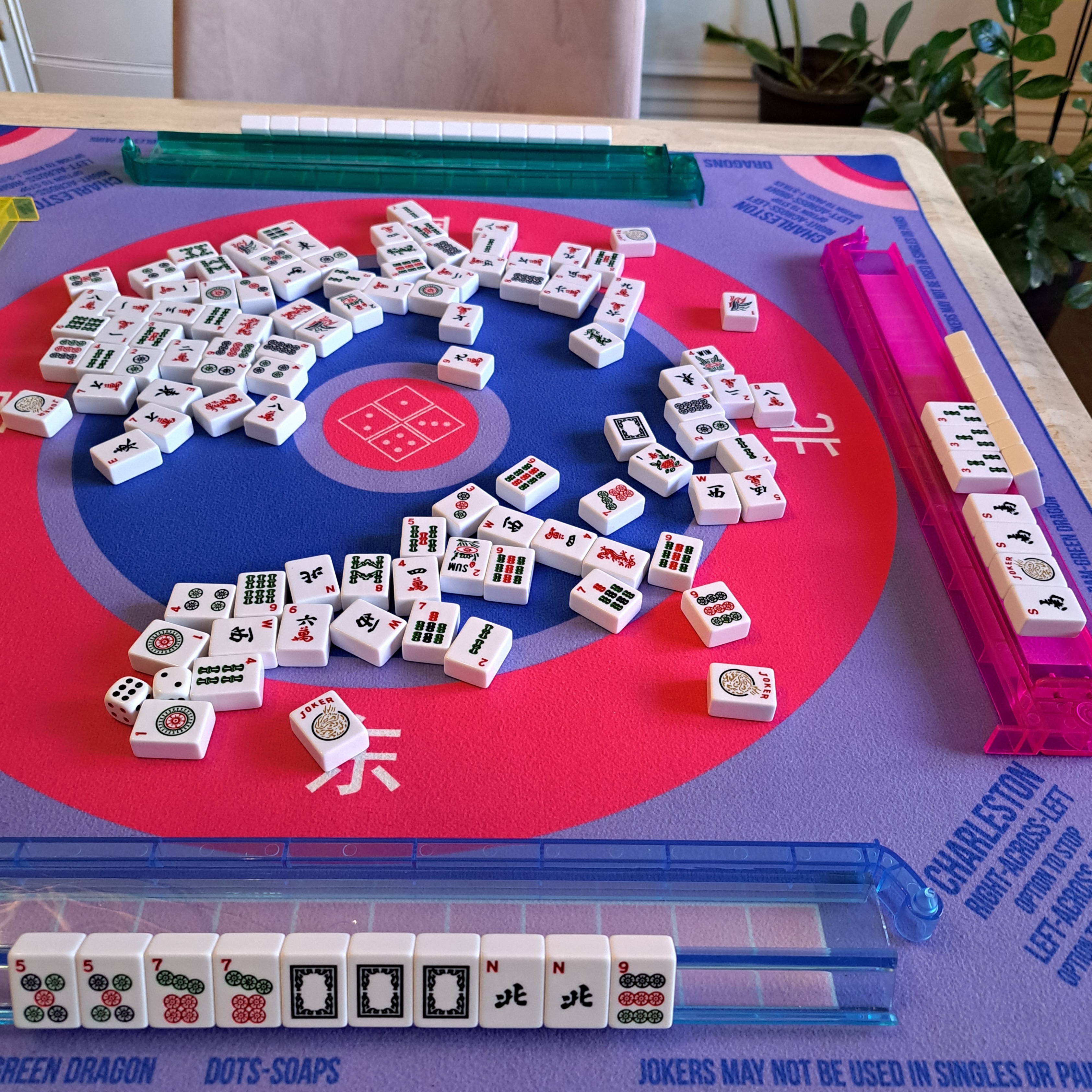 Mahjong hand showing two North wind tiles and two exposures on another rack for the hand on the 5th line of Winds and Dragons pattern from 2025 NMJL card.