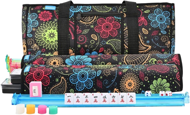 A colorful floral patterned bag with various game components, including dice, markers, and a set of tiles, arranged neatly in front.